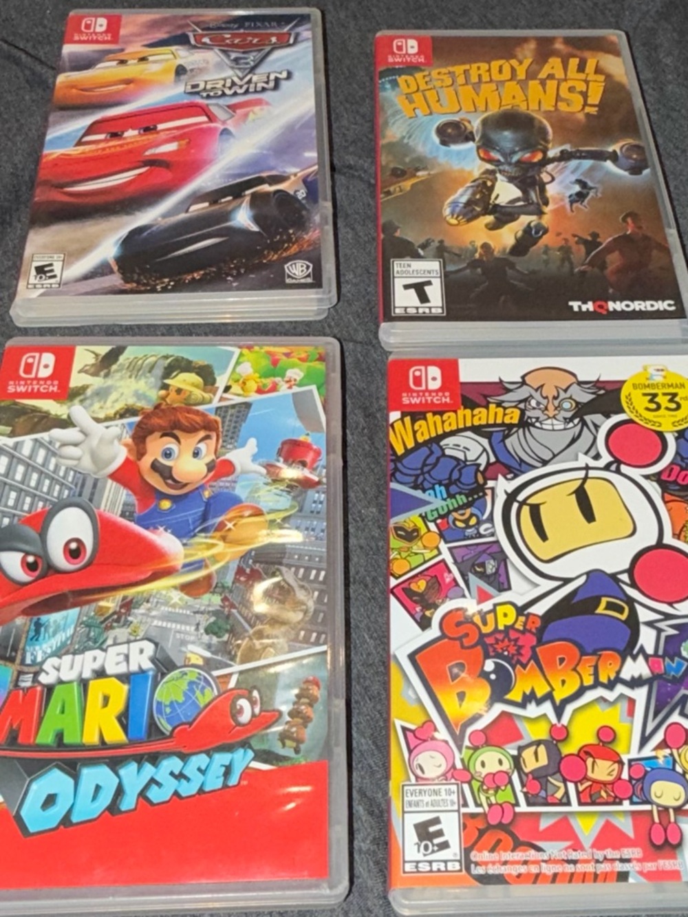 Nintendo Switch Game Bundle - Super Mario Odyssey, Super Bomberman, Cars 3 and +